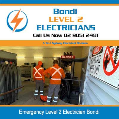 Emergency electricians in high-visibility safety gear checking the electrical work in Bondi