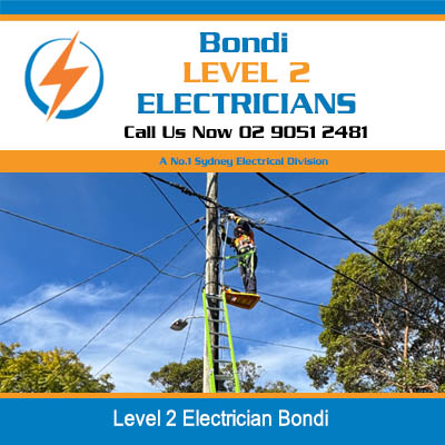 Level 2 electrician performing maintenance on power pole in Bondi