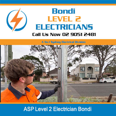 ASP level 2 electrician in high-visibility vest working near street in Bondi